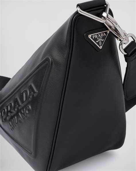 prada triangolo|Prada triangle leather handbag.